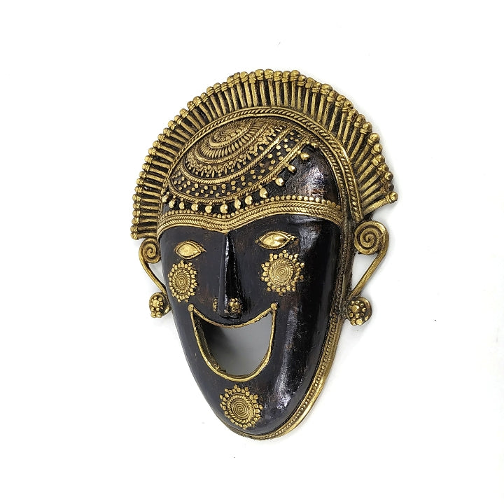 Traditional Dhokra lost-wax brass mask with joyful expression