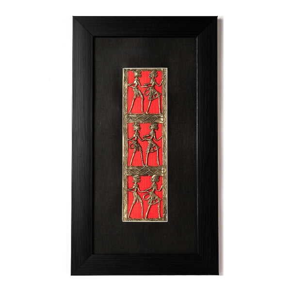 Handcrafted brass dance wall art with three vertical Dhokra panels on a striking red mount