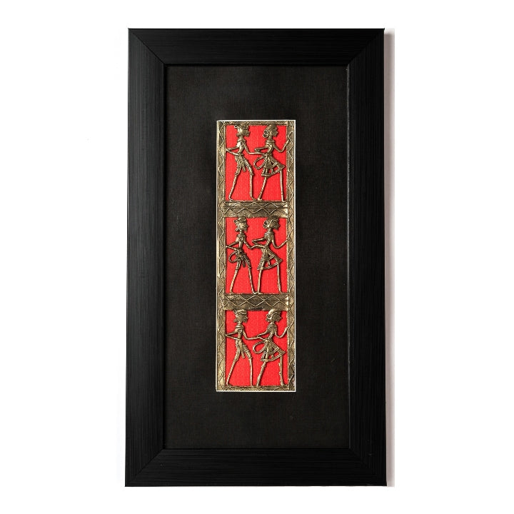 Handcrafted brass dance wall art with three vertical Dhokra panels on a striking red mount