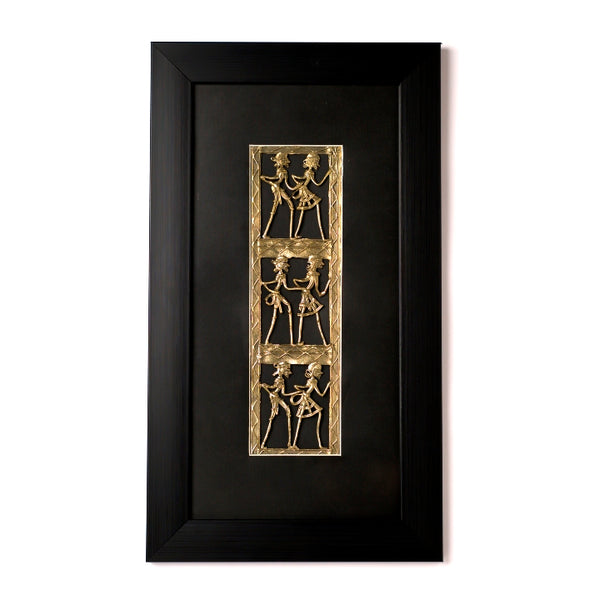 Handcrafted brass dance wall art with three vertical Dhokra panels on a sophisticated black mount.
