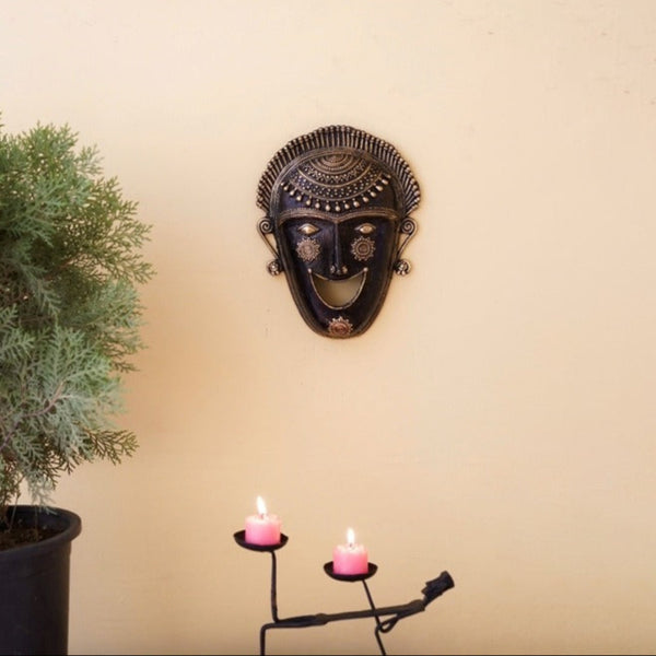Front view of handcrafted brass Aura Mask in Dhokra art
