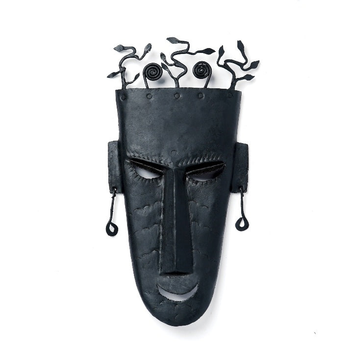Iron Sentinel tribal mask displayed on wall – traditional handmade décor