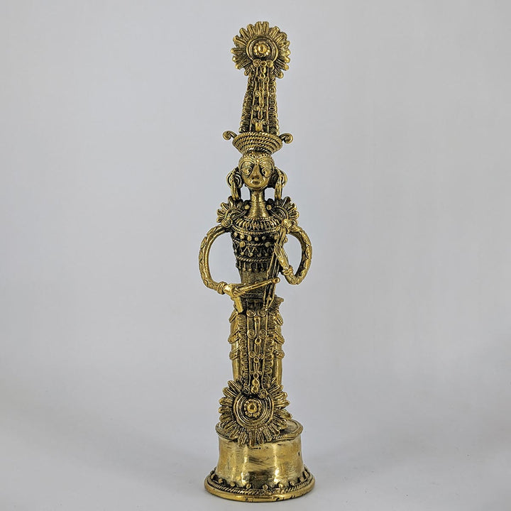Traditional Dhokra brass Jhitku Mitki statue with exquisite detailing and golden hues.
