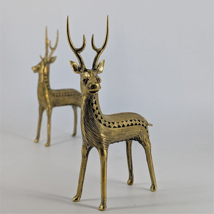 Handmade Dhokra brass deer statues with exquisite detailing and golden hues
