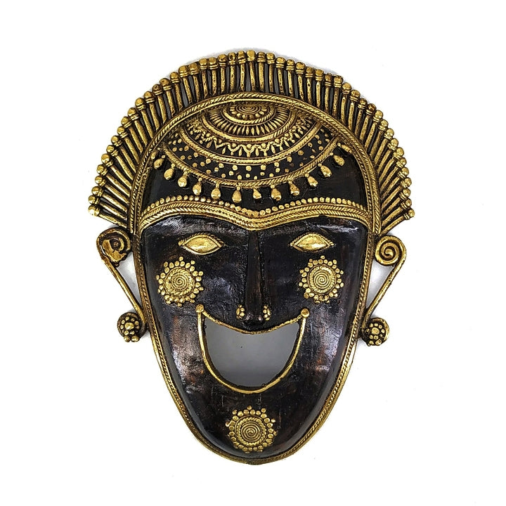 Close-up of tribal motifs on Bastar-style wall mask
