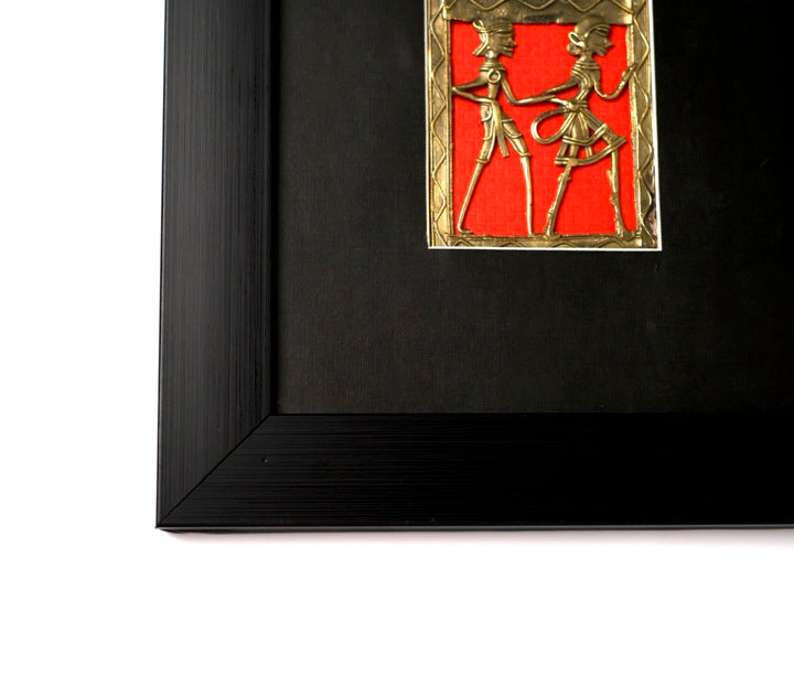 Side view of Rhythm Crimson brass wall décor, showcasing the contrast between gold brass and bold red.